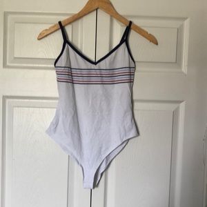 Red, white and blue striped body suit